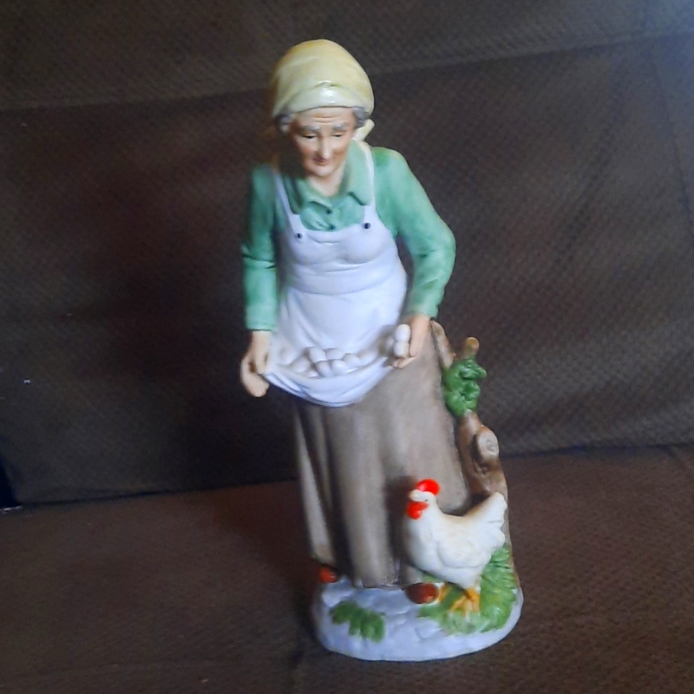 Antique lady with hen